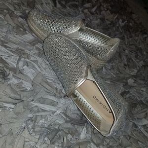 Gold sparkly slip on shoes 6.5 runs big